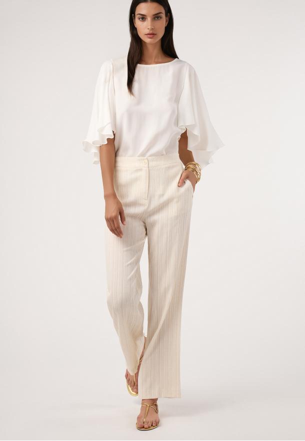 Pantalón fluido falso plisado. Conjunto CRUDO