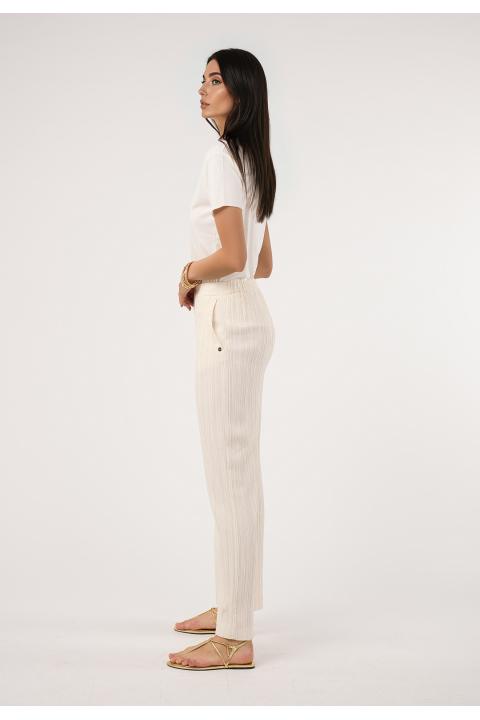 Pantalón fluido falso plisado. Conjunto CRUDO